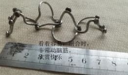 五连环解法视频,巧手解锁传统智力游戏之谜